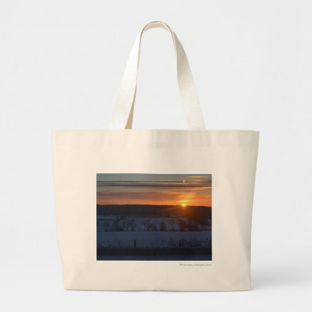 Sunrise over snow tote bag