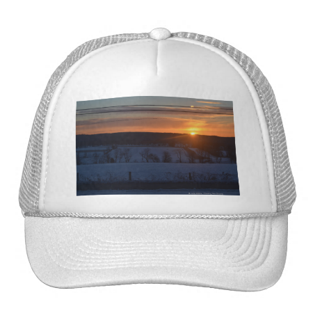 Sunrise over snow trucker hat