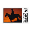 Sunset Cowboy Postage Stamp by chysshirts Sunset Cowboy Postage Stamp