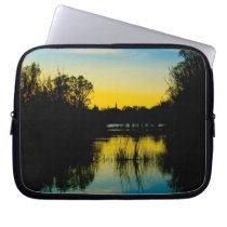 Sunset over a Lake Laptop Sleeves
