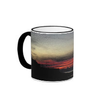 Sunset over the sea in Aberystwyth mug
