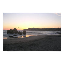 Sunset over the waves posters