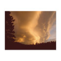 Sunset with tall yellow clouds in Idaho Springs CO postcard