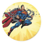 Superman breaks chains round sticker