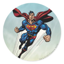 Superman leaps upward round sticker
