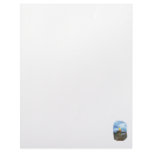 Surfboard on Boardwalk at beach against sky Letterhead