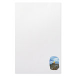 Surfboard on Boardwalk at beach against sky stationery