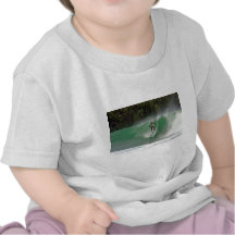 Surfer dropping into perfect green surfing wave t-shirts