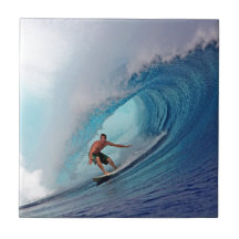 Surfer surfing a huge wave. tile