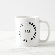 Surrounded By Idiots mugs