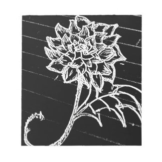 Rose in black notepad