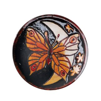 Wooden decor with butterfly. porcelain plate