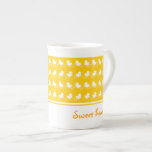 sweet yellow design with row of white ducks mugs