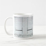 Swings covered with snow coffee mug