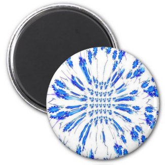 Swirl pattern of blue and white small flowers magnet