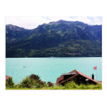 Swiss house with flag postcards