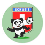 This adorable little panda is too cute! He's featured in front of a large flag from Switzerland and ready to play football and score some goals. This cute design is perfect for football players and soccer fans.