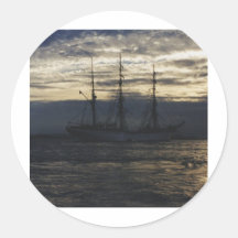 Tall ship in the evening round stickers