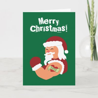 This funny holiday design features a tough santa with a heart tattoo on his 