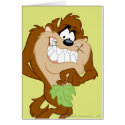 Taz holding a leaf cards