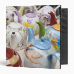 Teapots on sale in Leipzig, Germany Vinyl Binder