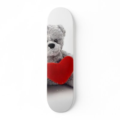 Teddy Bear Toy Holding A Heart On White Background Skateboards by lifesphere