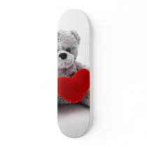 Teddy Bear Toy Holding A Heart On White Background skateboards by lifesphere Teddy Bear Toy Holding A Heart On White Background skateboards