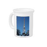 Telecommunications tower under a blue sky drink pitchers