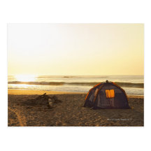 Tent and Burned out Campfire on the Beach. Post Cards