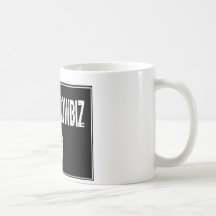 Text Sign- Thats Showbiz Kid- White / Black Coffee Mug