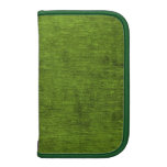 Textura verde de la tela de felpilla del navidad planificador
