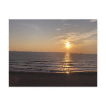The beach at sunset postcards