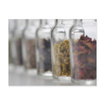 The herbs which a glass bottle contains postcard
