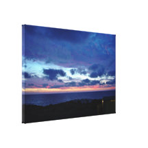 The last red glow of the sun stretched canvas print