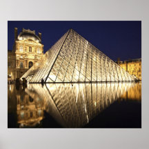 The night view of the glass Pyramid of Musee du Posters