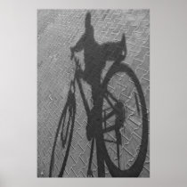The shadow of a bicycle posters