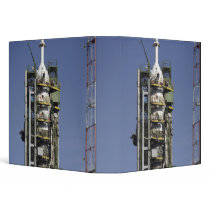 The Soyuz rocket is erected into position 3 Ring Binder