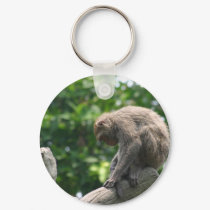 The thinker - monkey on a tree branch keychains