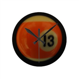 Thirteen pool ball clocks.