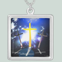 Three Crosses At Calvary necklaces
