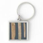 Three decorated bones key chain