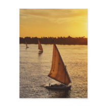 Three falukas with sightseers on Nile River at