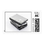 Three hard disks stacked postage