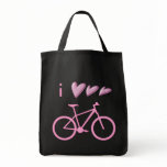 Three hearts and a pink mountain bike bag.