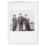 Three people at a beach cards