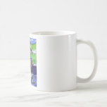 Three schnauzers in window coffee mug