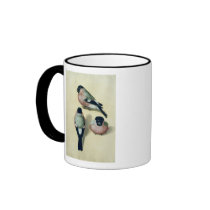 Three studies of a bullfinch coffee mug