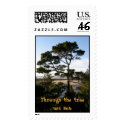 Through the tree we sea. postage