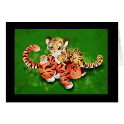 cute tiger cubs playing. two cute little tiger cubs