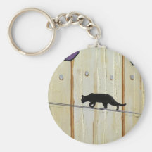 tightrope walking cat keychain